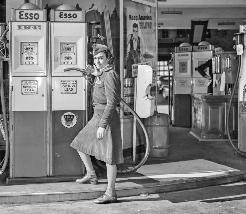 Girl at gasoline pump, New York, 1940.