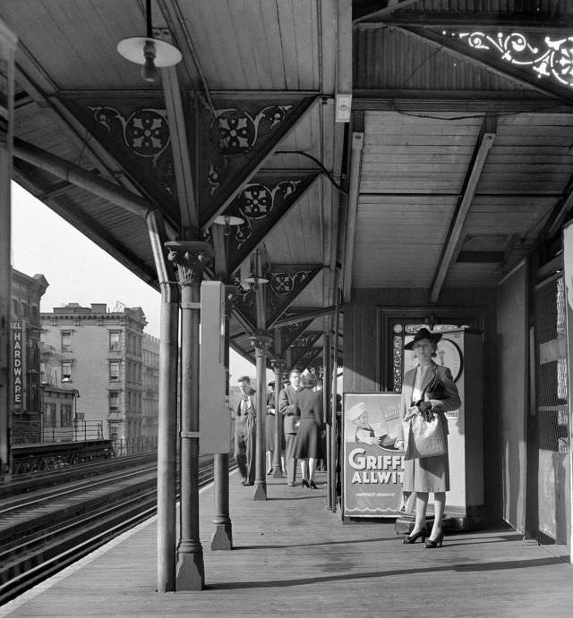 Third Avenue elevated railway station at 8-30 a.m, New York, 1942.