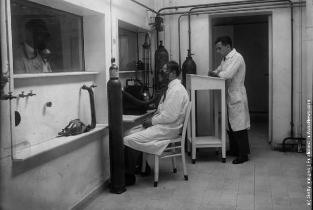 Workers testing safety equipment in a German factory, 1935.