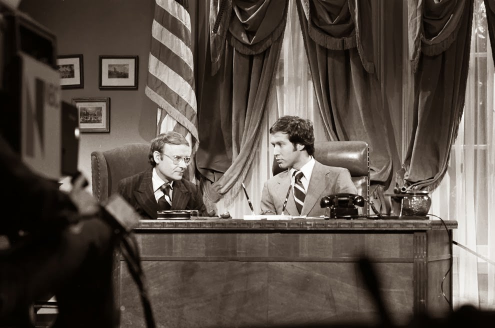 Buck Henry and Chevy Chase
