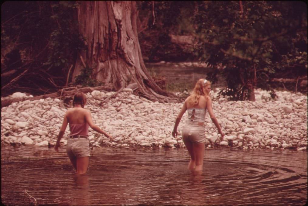 Teenage girls wading in the Frio Canyon River near Leakey, Texas, 1973.