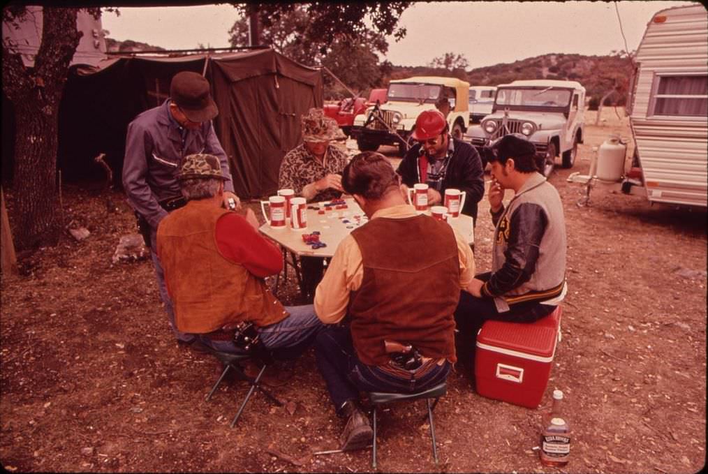 Deer hunters playing poker at their permanent camp, 1972.