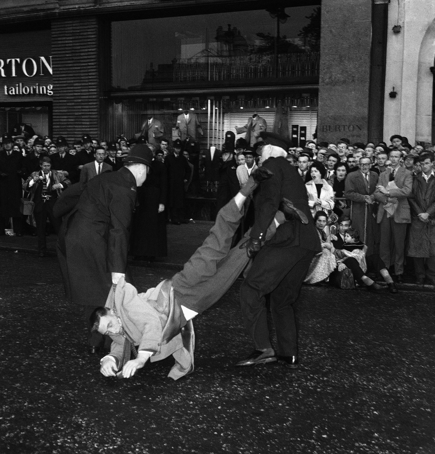 A demonstrator being arrested at a Ban-the-bomb rally in Trafalgar Square, 1961.