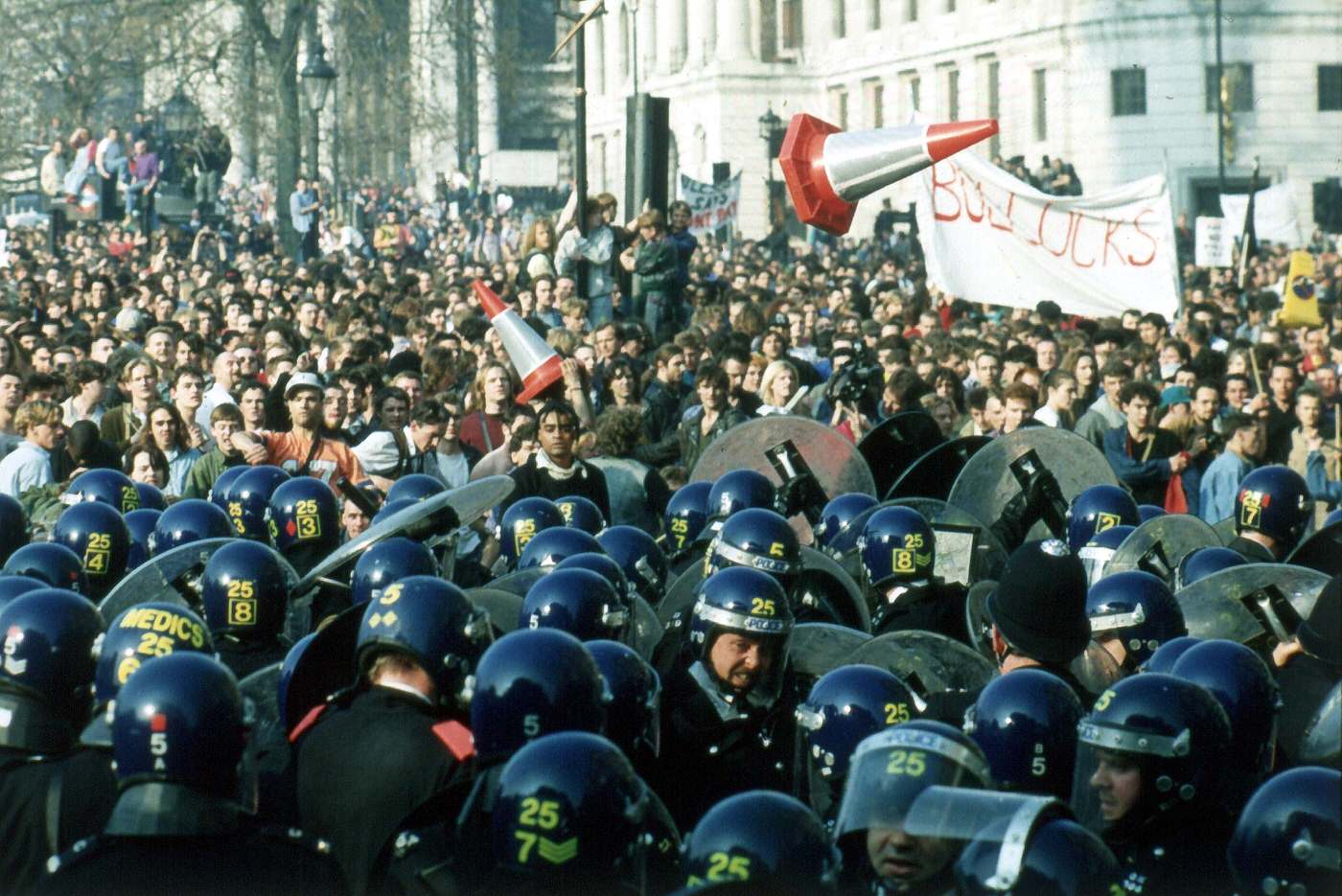 Anti-Poll Tax demonstrators pelting police with missiles in Trafalgar Square, 1990.