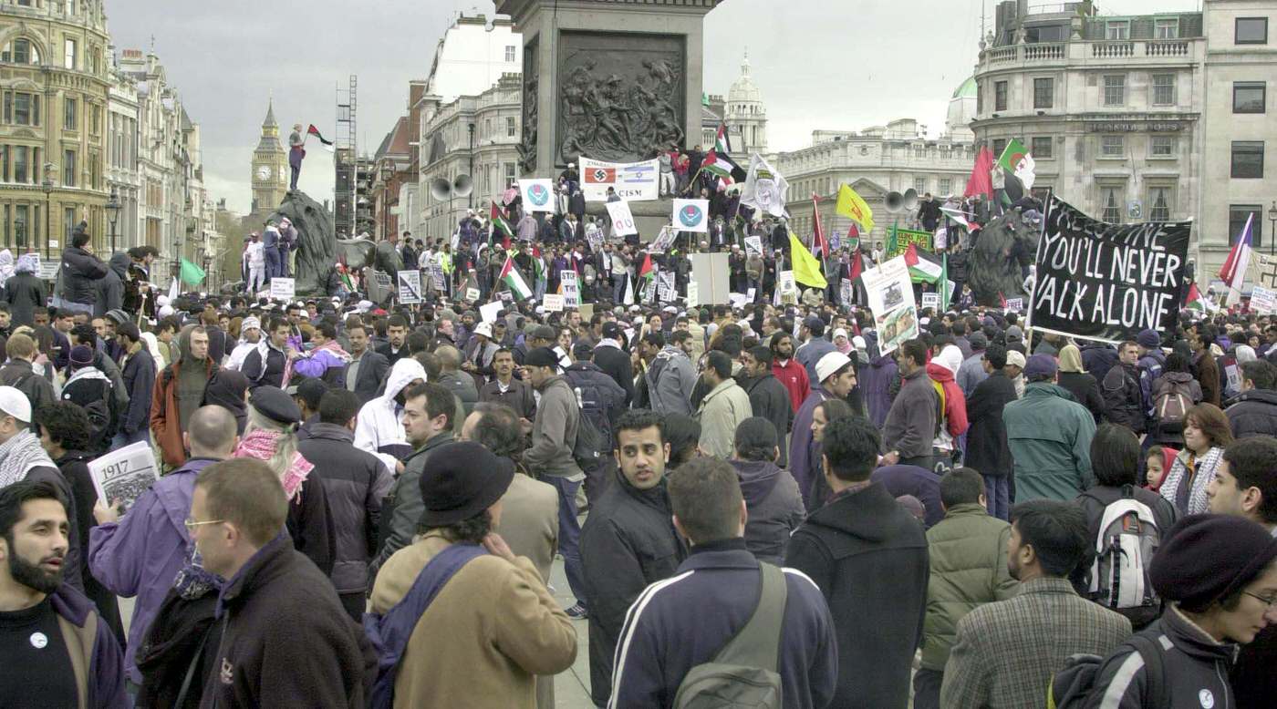 A demonstration by British Muslims protesting Israeli actions against Palestinians, 2002.