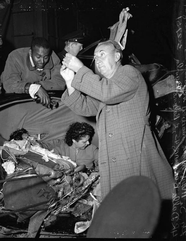 Runaway box car vs. autos in train crossings accident at 25th and Alameda, Los Angeles, May 25, 1951