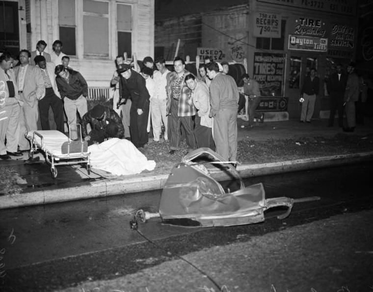 Car hit fire plug, the other car hit by falling pole, Arapahoe Street and Washington Boulevard, Los Angeles, April 15, 1954