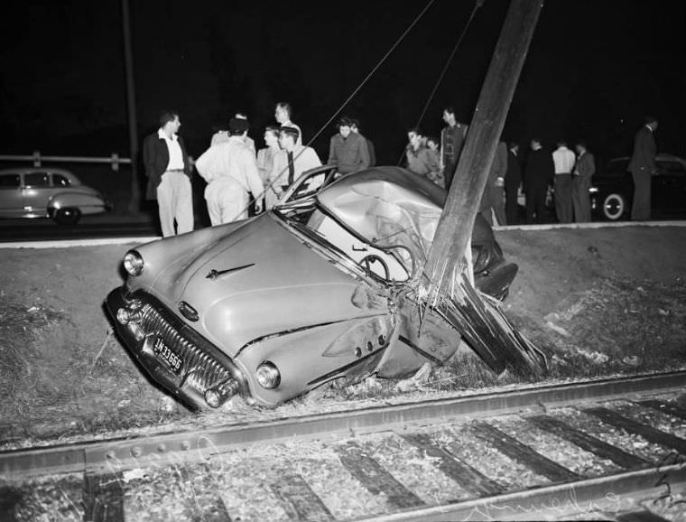 Car against utility pole on Pacific Electric Tracks, California, November 1, 1951