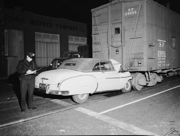 Car rear-ends train, 14th and Alameda streets, Los Angeles, November 7, 1951