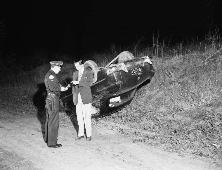 Overturned car at Stocker and La Brea, California, April 19, 1951