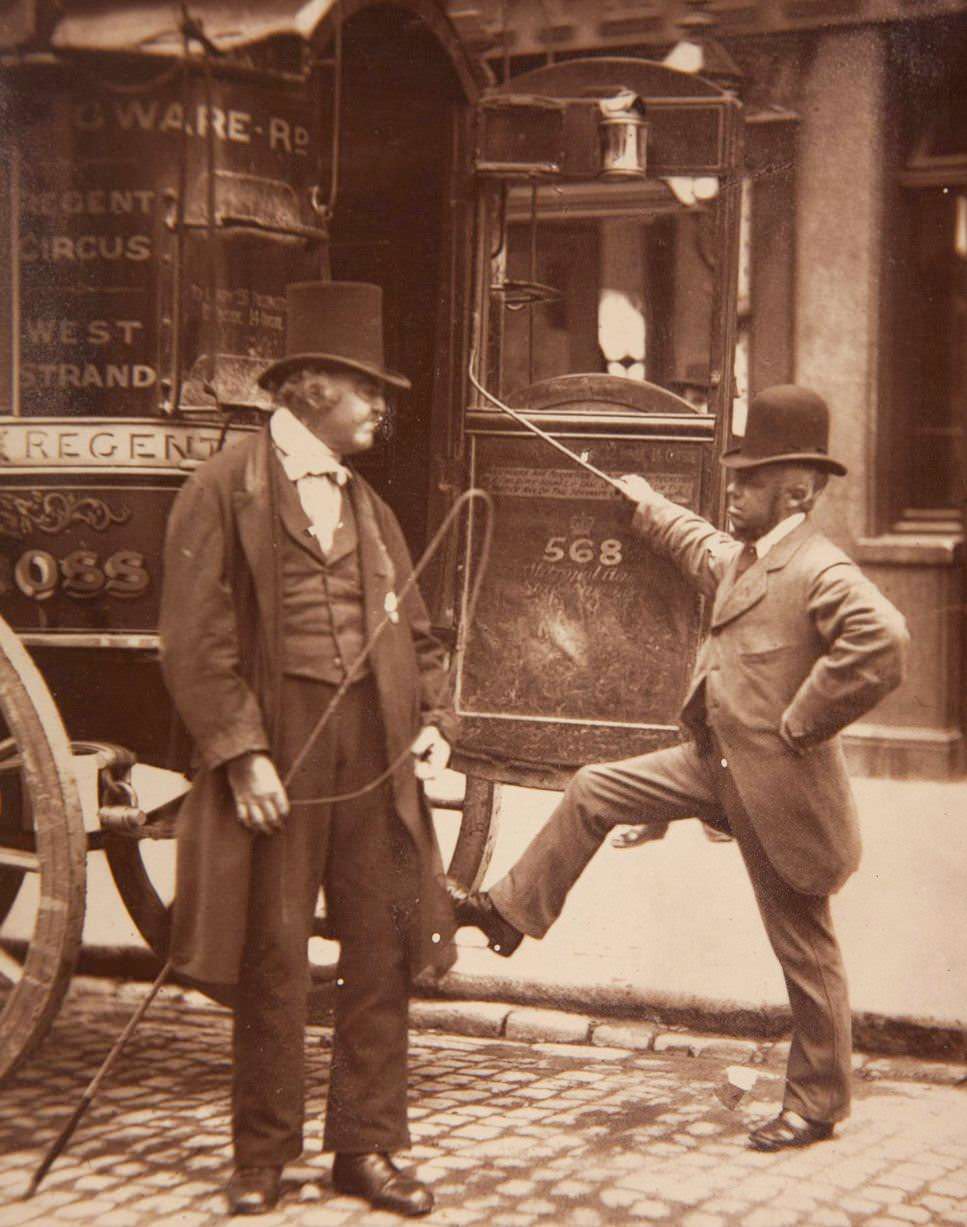 Cast-Iron Billy (a driver, holding whip).