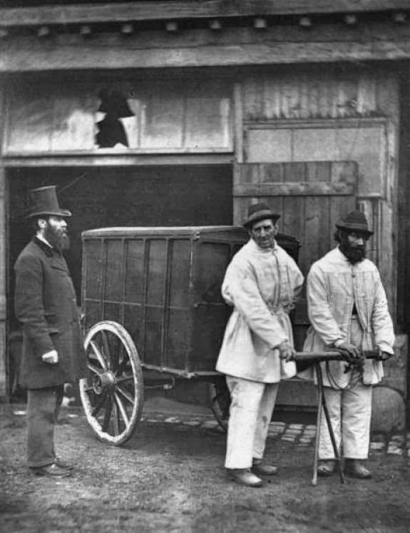 Victorian public disinfectors sanitizing the streets, 1870s.