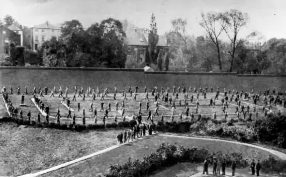 Prisoners walking around the exercise yard of Holloway Prison, London, 1890.