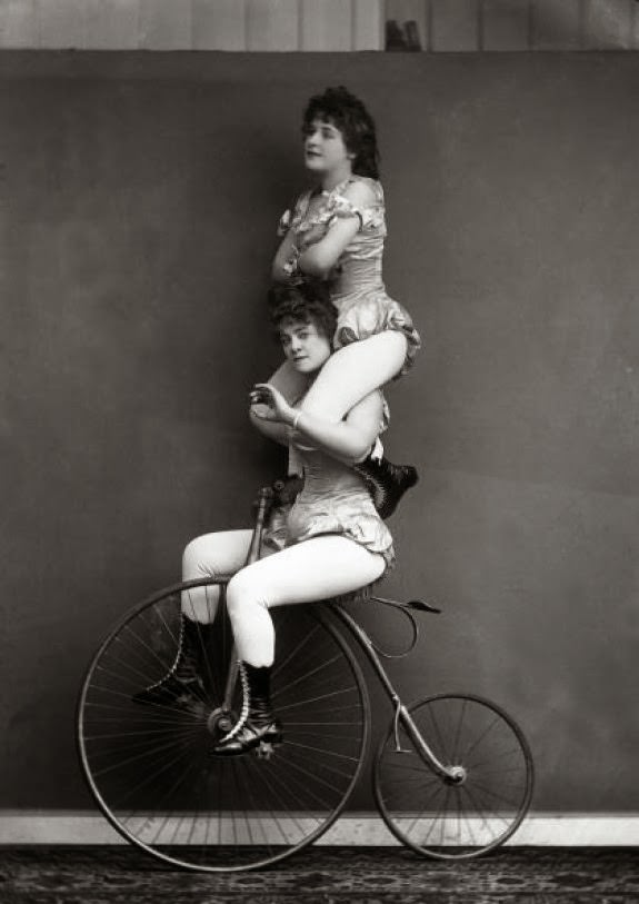 Victorian trick cyclists performing a balancing act, 1891.