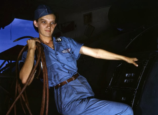 Lorena Craig works a man-size job at the Naval air base in Corpus Christi, Texas, 1942.