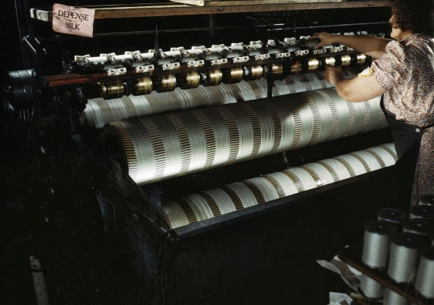A water stretching machine stretches parachute shroud lines in Manchester, Connecticut, 1942.