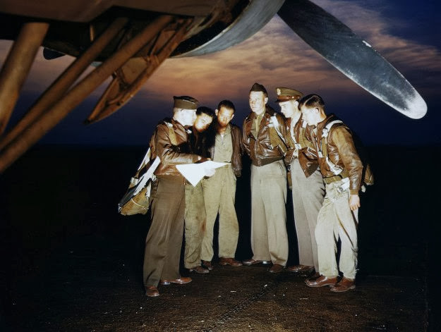 A combat crew receives final instructions before taking off in a YB-17 bomber at Langley Field, Virginia, 1942.