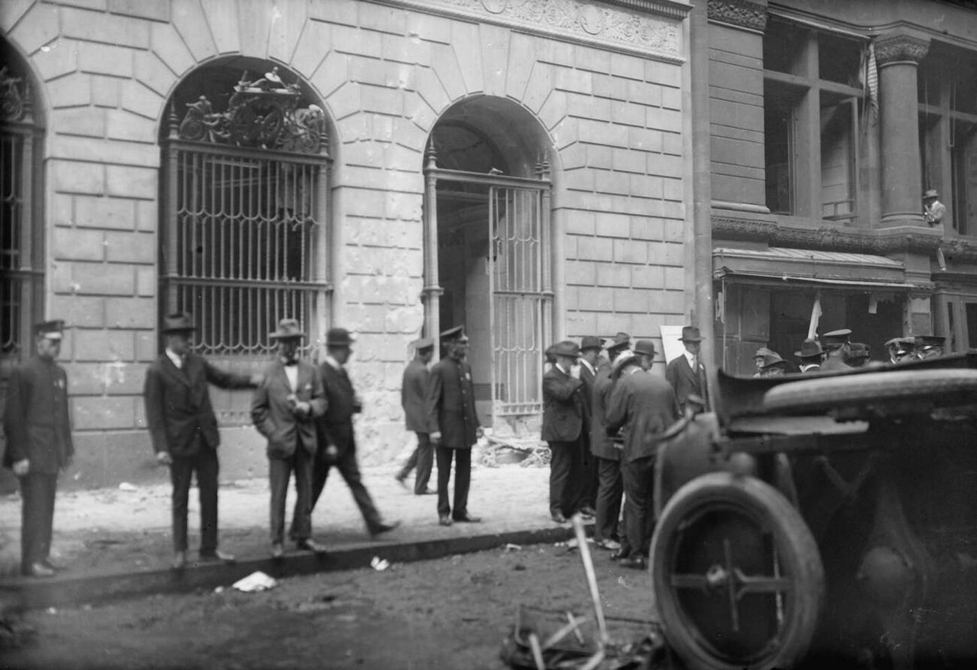 Men gathering after the Wall Street bombing, New York City, 1920.
