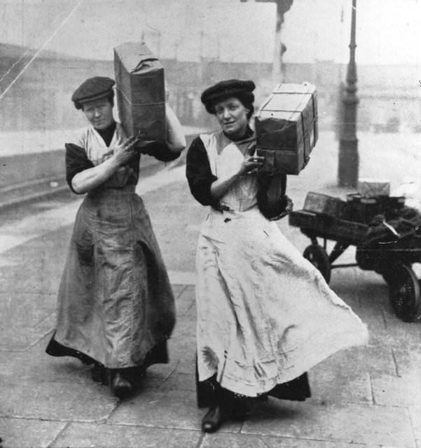 Two women replacing male porters at Marylebone Station, London, during World War I, 1915.