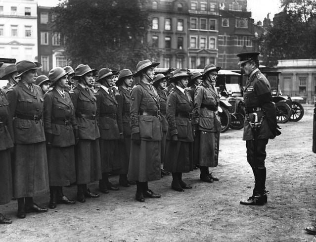 The Women's Reserve of the British Army National Motor Volunteers being addressed by an officer, 1916.