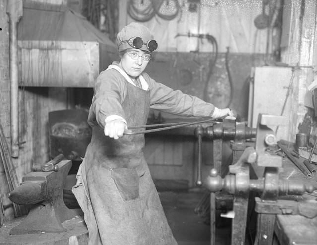 A woman shaping a steel knee splint at the Kensington War Hospital supply depot, 1917.