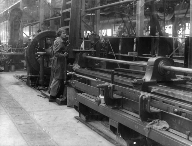 A young woman in an armaments factory in WWI, 1916.