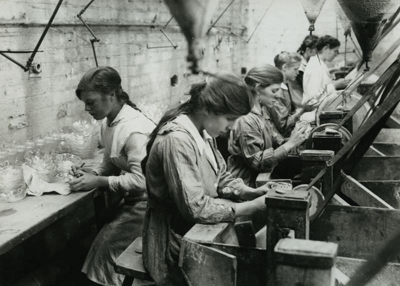 British women in a glass factory cutting shop near Birmingham.