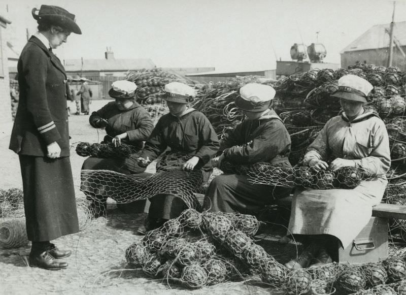 Mine net workers wiring floats together.