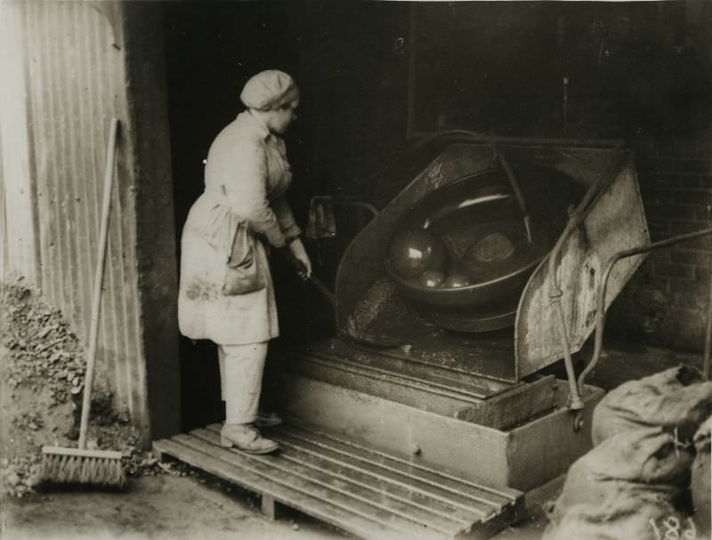 Working a machine to extract metal from rubbish.