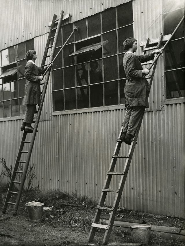 Women cleaning windows.
