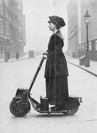 Lady Florence Norman, a suffragette, on her motor-scooter travelling to work in London, 1916.
