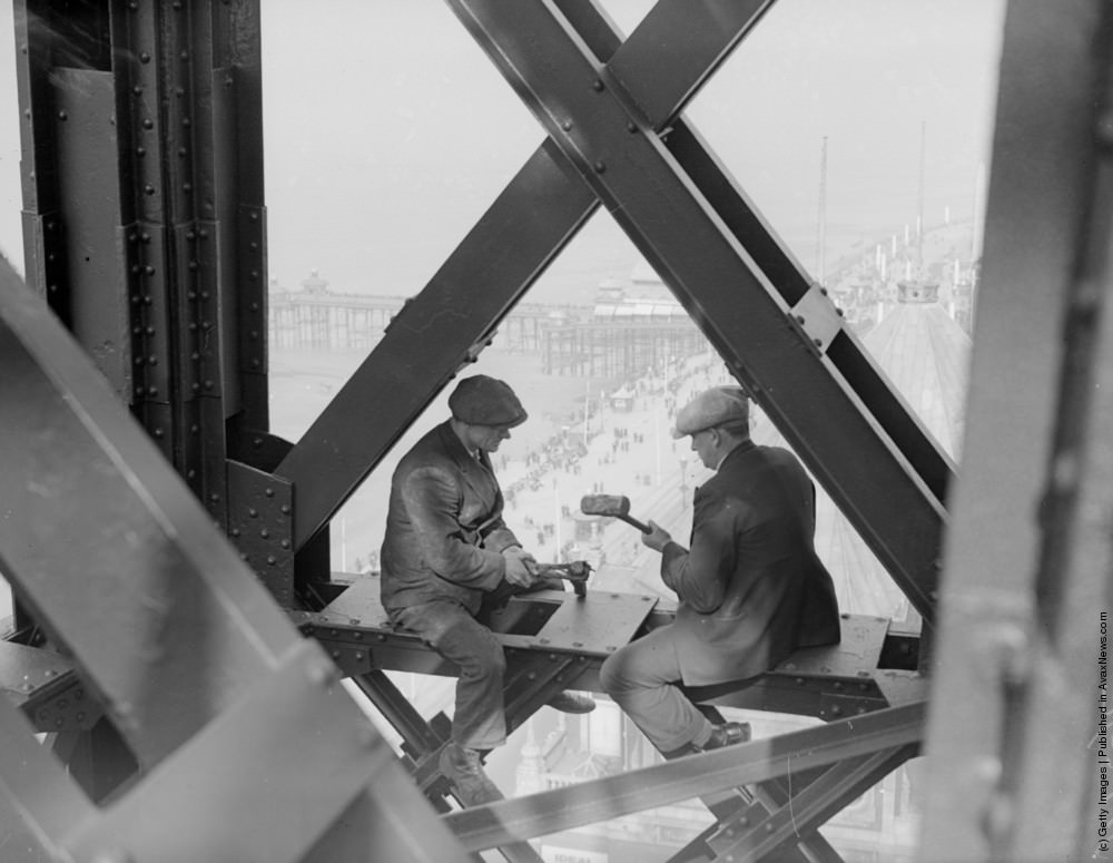 Two men working on a girder in Blackpool Tower, 1933.