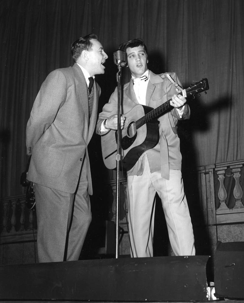 Dewey Phillips and Elvis on stage at Ellis Auditorium, 1955.