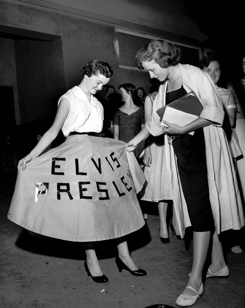 A fan at Elvis' concert at Ellis Auditorium, 1956.