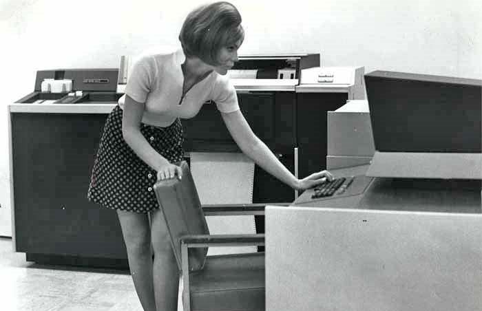 In the early 1970s, two striking symbols of change stood side by side in offices around the world: miniskirts and vintage computers. Each represented a different kind of revolution—one in fashion, the other in technology.