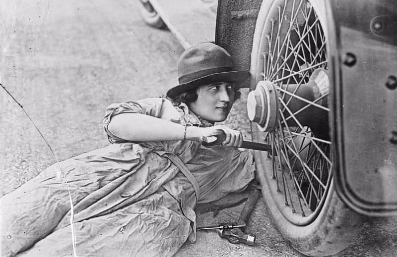 Women Repairing Cars early 1900s