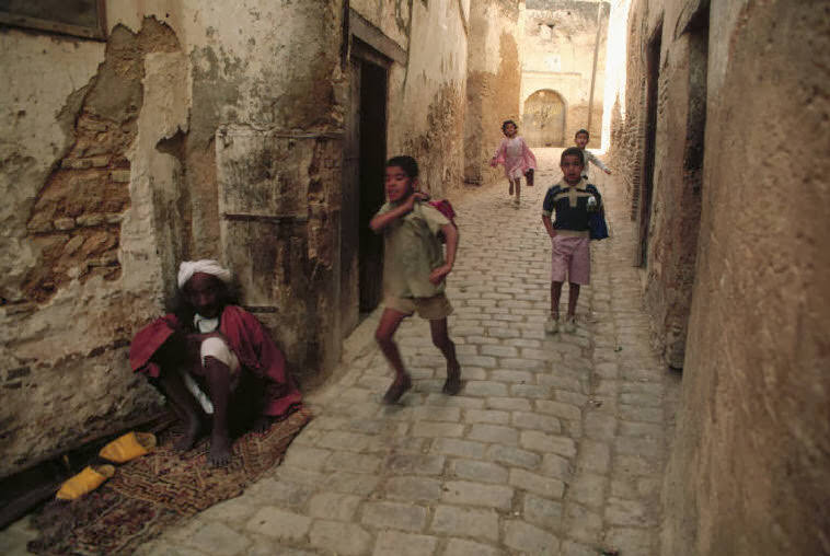 Beggar in old town, 1984.