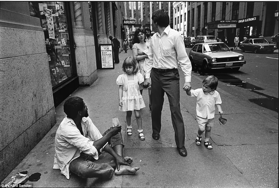 Two children stare curiously at a homeless man on 32nd Street, 1981.
