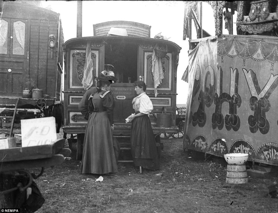 Women chat outside caravans stationed at the city's Town Moor.