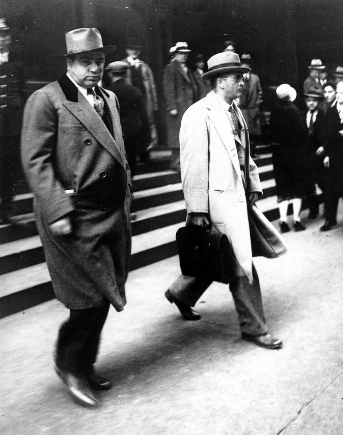 Al Capone leaving Federal Court in Chicago with his attorney Michael Ahern, October 11, 1931.