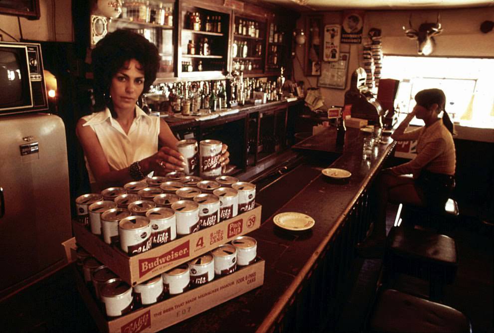 Empty steel beer and soft drink cans accumulated near Taos, New Mexico, to be used in building experimental houses, 1974.