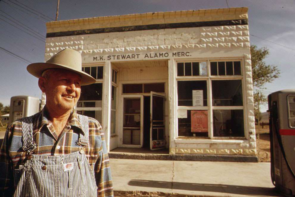 M.K. Stewart, owner of this general store in Alamo, Nevada, wears a TLD (thermo-luminescent dosimeter) to measure radioactive fallout from past atomic testing, 1972.