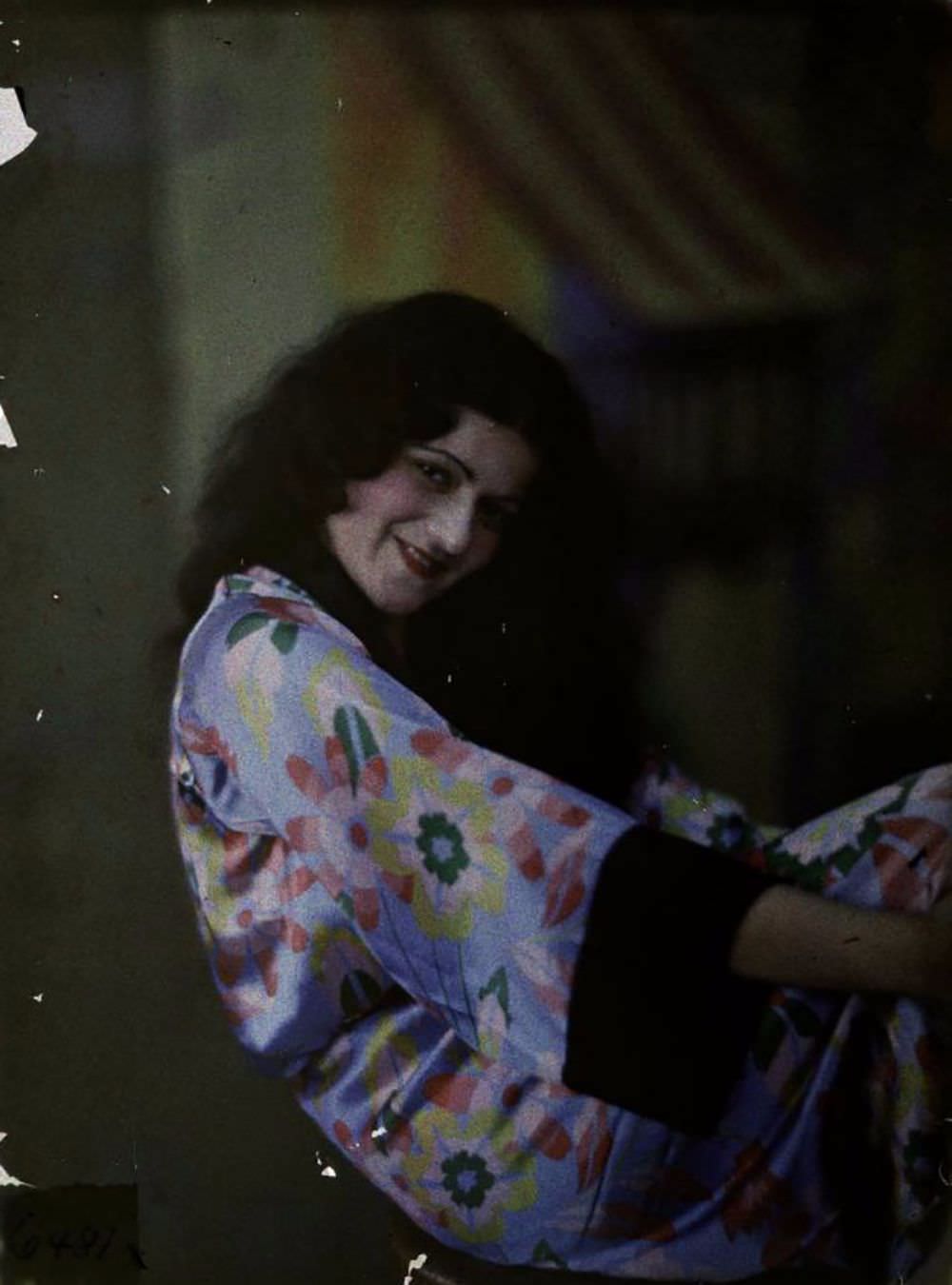 Woman in floral silk robe, 1915