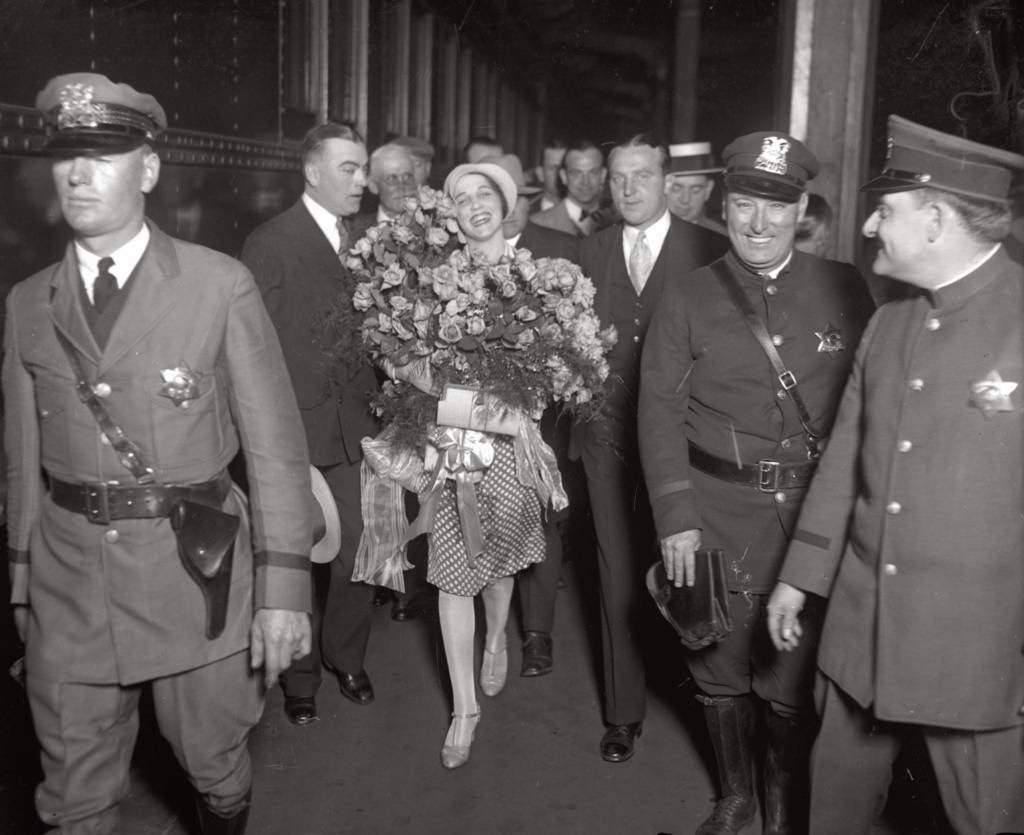 Miss Universe Ella Van Hueson, 22, arrived home in Chicago for a parade in her honor after winning the International Pageant of Pulchritude in Galveston, Texas, 1928.