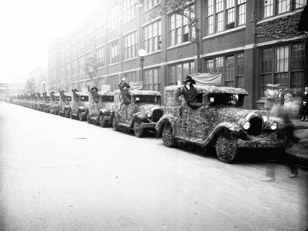 Cars covered in flowers for a Chrysler Parade to honor beauty queens, 1926.