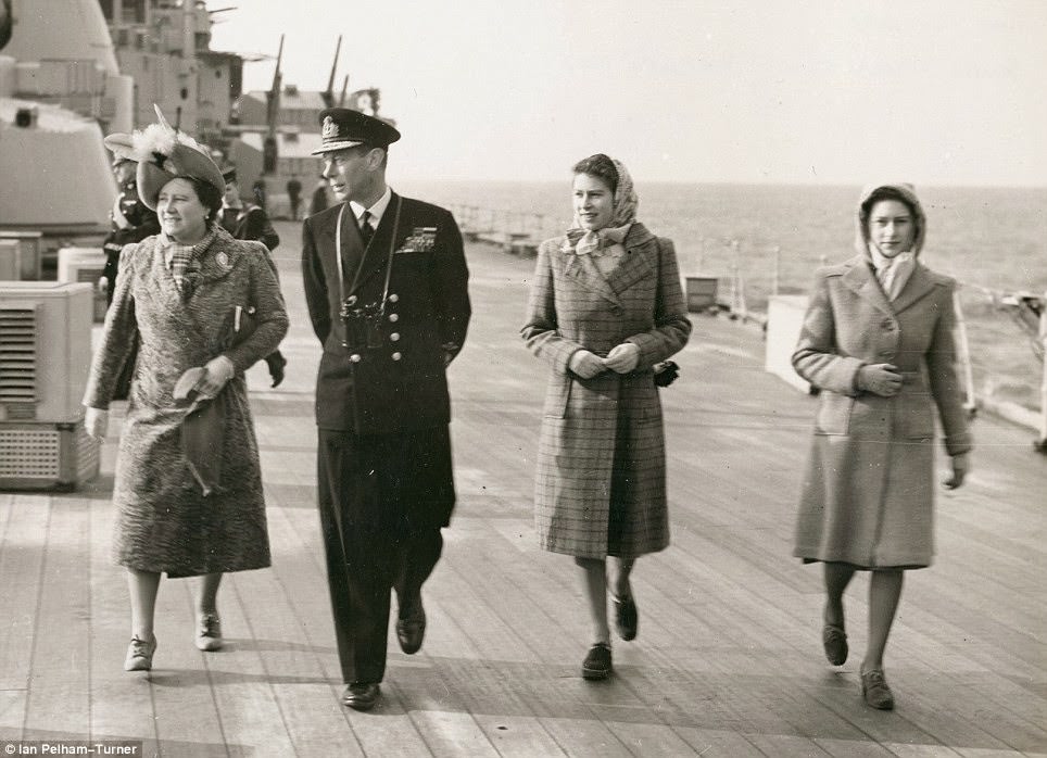The Queen joins her father King George VI on a tour of HMS Vanguard South Africa in 1947.