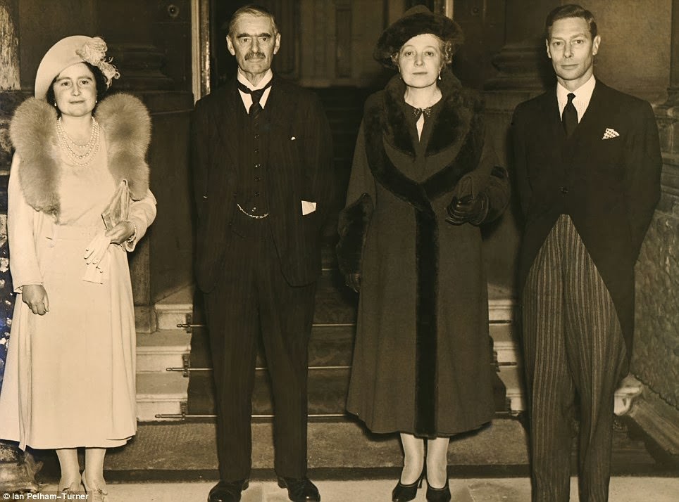 King George VI and the Queen Mother with the then Prime Minister Neville Chamberlain and his wife in 1938.