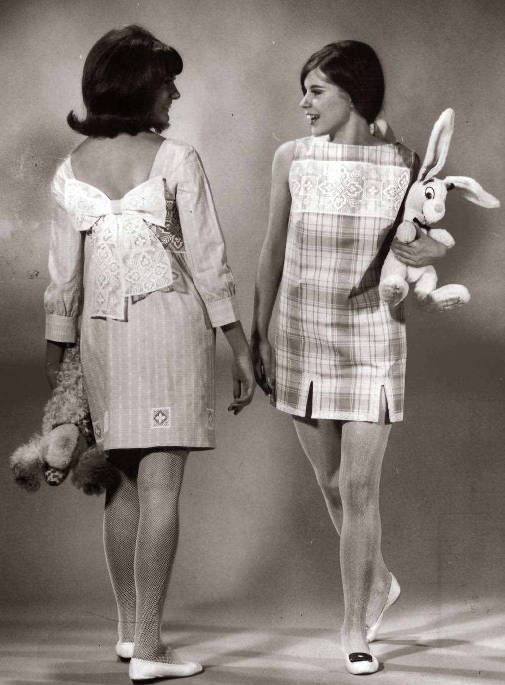 "Venetian lace is used for this pair. Pam Kimmell, left, Wheaton high school, wears a short dress of turquoise and white lawn ($35), trimmed with giant bow and cut-outs at hemline. Teri's blue on white plaid cotton skimmer ($22.95) features wide band of lace and narrower lace edging at hem." — Earl Gustie, Chicago Tribune, Nov. 3, 1966