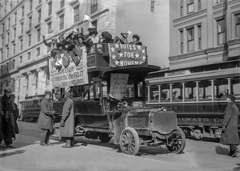 Suffragists on a bus in New York City, part of the "hike" to Washington, D.C., 1913.