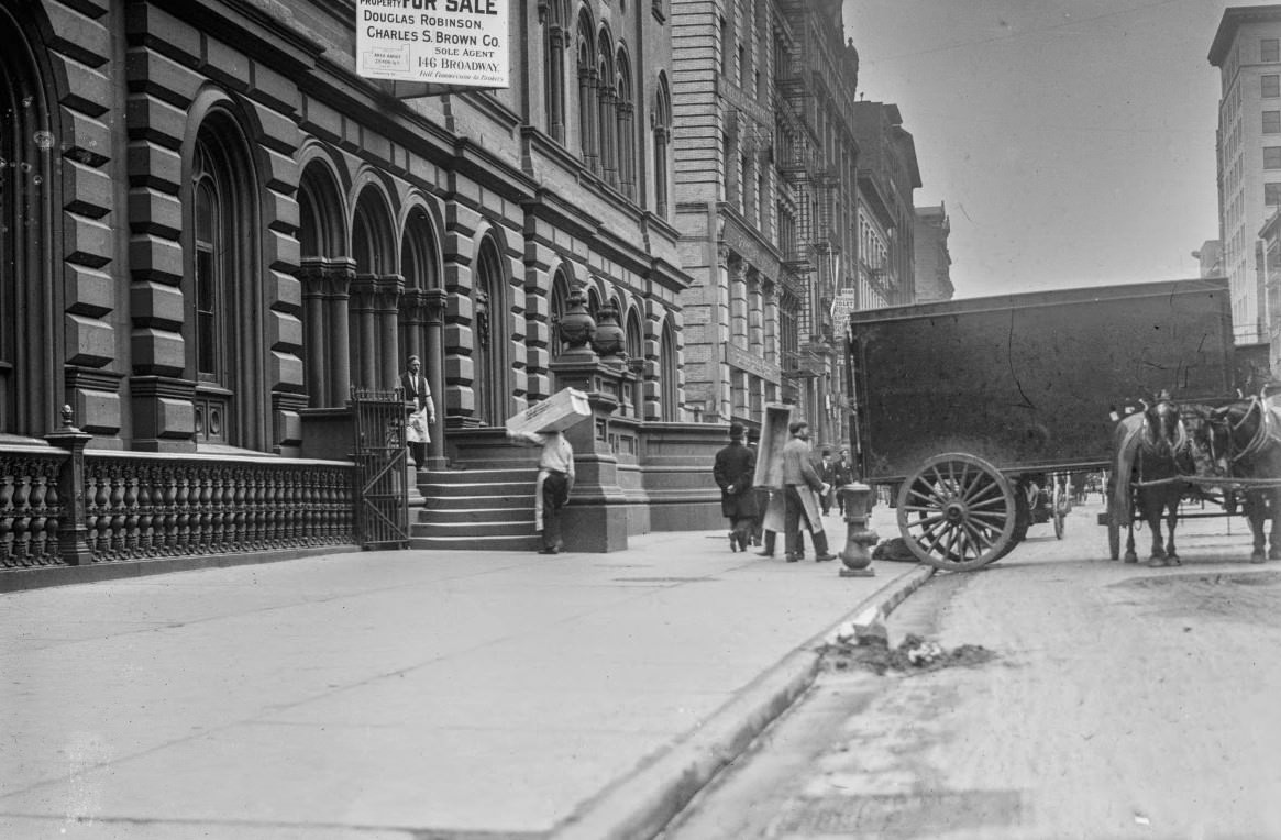 Moving books from the Astor Library to the New York Public Library, 1911.